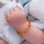Pulseira / tornozeleira de âmbar bebê barroco mel polido - 14 cm