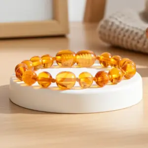 Pulseira / tornozeleira de âmbar bebê barroco mel polido – 14 cm - Âmbar Báltico Original