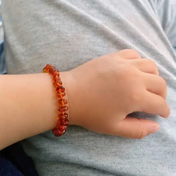 Pulseira / tornozeleira de âmbar bebê arredondado cognac polido - 14 cm