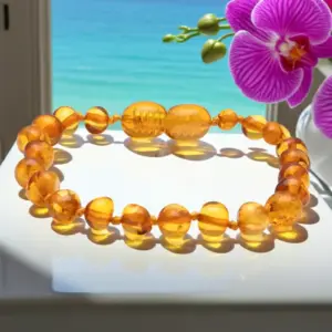Pulseira de âmbar adulto barroco mel polido - Âmbar Báltico Original